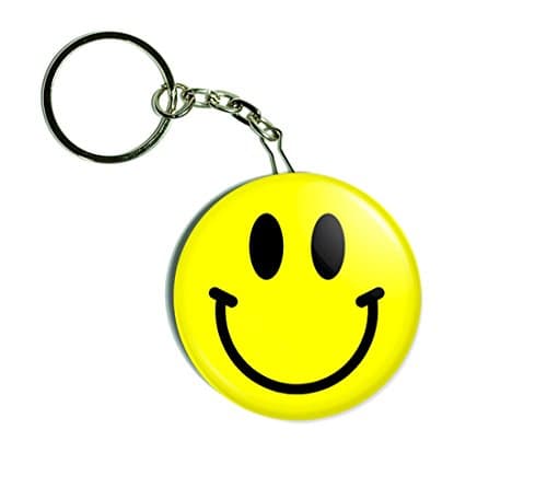 Yellow smiley face 1.75 inch (44 mm) button keychain.