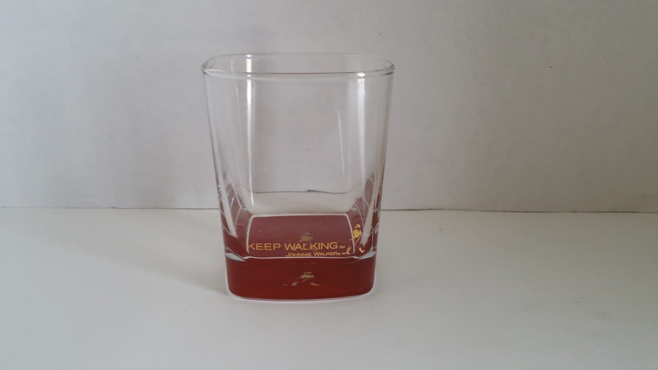 Johnnie Walker Keep Walking Neat Glass - Red Base with Gold Lettering