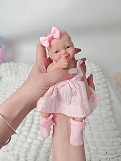 7" Reborn Babies Silicone Full Body Micro Realistic Newborn Doll Lifelike Eyes Open Smile Baby Girl Looking Real with Pink Dress Accessories for Kids Birthday Gift