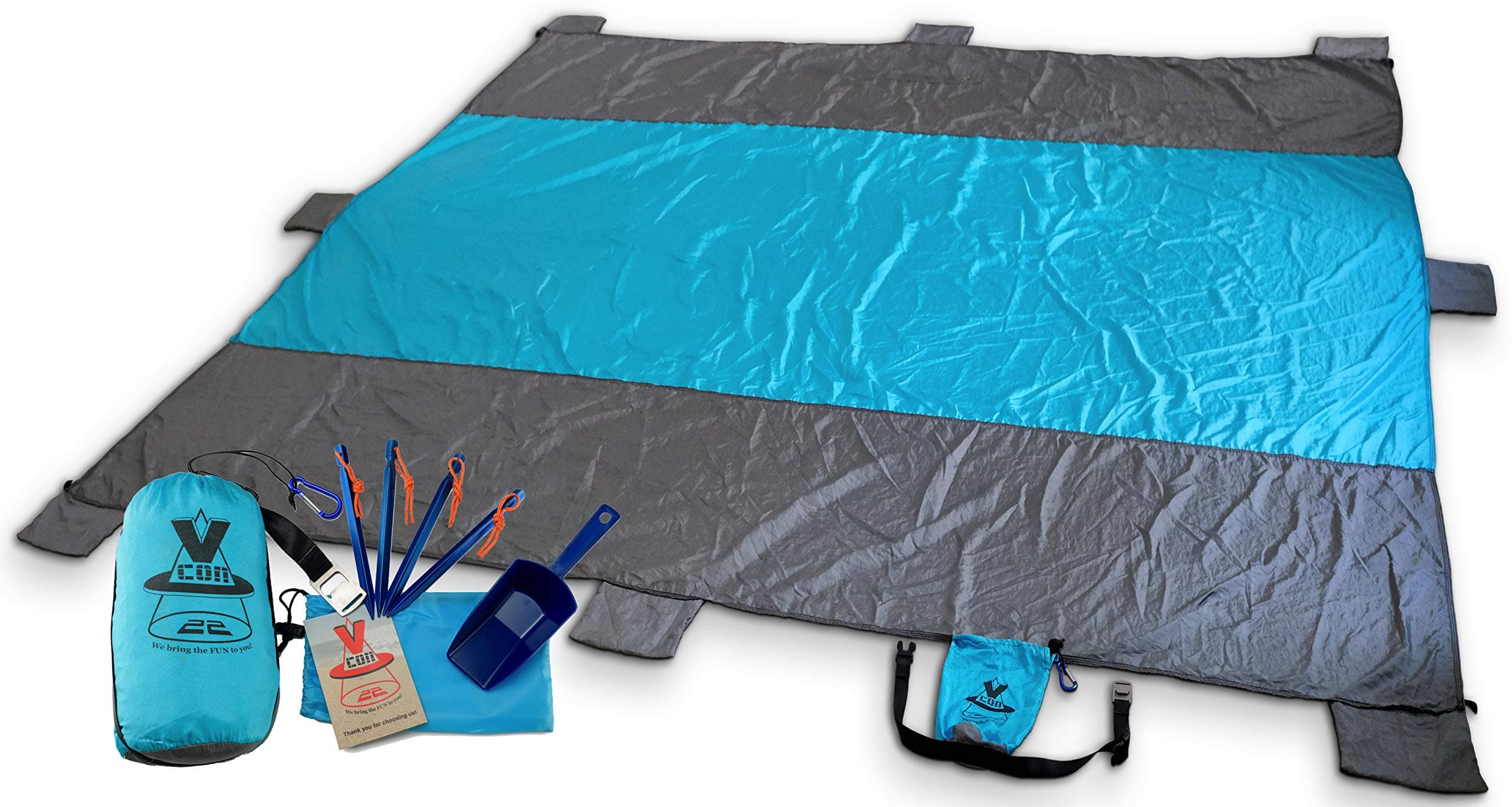 Beach Blanket Sand Proof 10x9ft Soft Quick Dry with Sand Shovel Bottle Opener 8 Sand Pockets Stakes Zippered Pocket. Oversized Outdoor Mat for Picnic Camping Hiking or Festivals